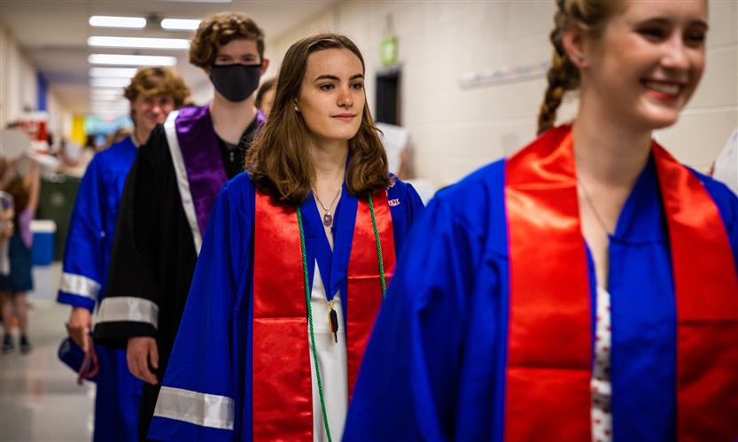 Seniors walk down the hall
